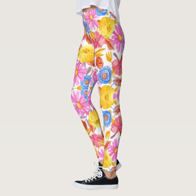 Leggings featuring a vibrant floral pattern  (Left)