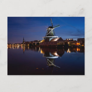 Leidschendam windmill with reflection at night postcard