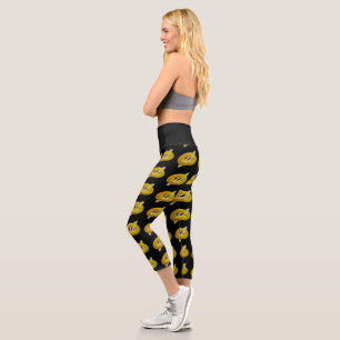 Lemon and cream design pattern on black capri leggings