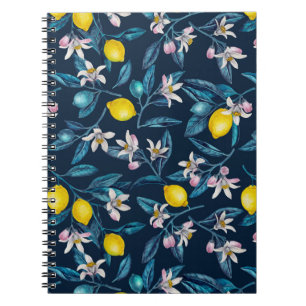 Lemon branches with blossoms and fruit on blue not notebook