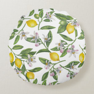 Lemon branches with blossoms and fruit on white round cushion