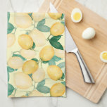 Lemons and Greenery Kitchen Tea Towel<br><div class="desc">Elegant watercolor painting of lemons and greenery on a pale lemon yellow background is a beautiful accent to brighten your kitchen or give as a gift. MATCHING items in our store.</div>