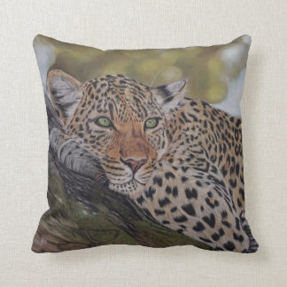 Leopard cat lying in a tree pillow