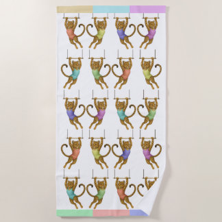Leopard on a trapeze Beach Towel