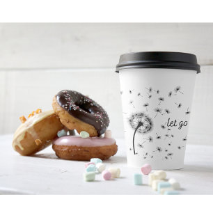 Let go, dandelion seed flowing in the wind   paper cups