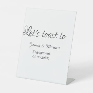 Let's toast to engagement party name date elegant  pedestal sign