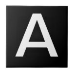 Letter Tiles<br><div class="desc">Ceramic letter tiles.  Upper or lower case letter tiles.  You customise with the letter or letters you need for your ceramic tile or mosaic sign.  Letter tile for weather proof signs,  house numbers.  White on black background.</div>