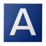 Letter Tiles Blue White<br><div class="desc">Ceramic letter tiles.  Upper or lower case letter tiles.  You customise with the letter or letters you need for your ceramic tile or mosaic sign.  Letter tile for weather proof signs,  house numbers.  White on black background.</div>