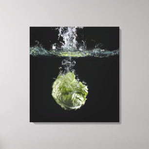 Lettuce splashing in water canvas print