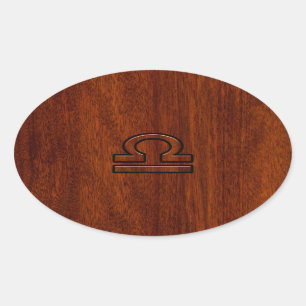 Libra Zodiac Symbol on mahogany style print Oval Sticker