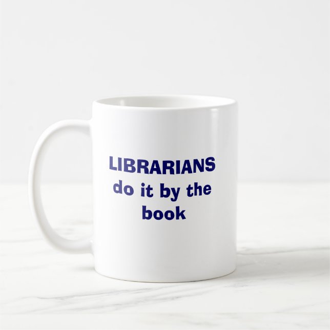 Librarians do it by the book coffee mug (Left)