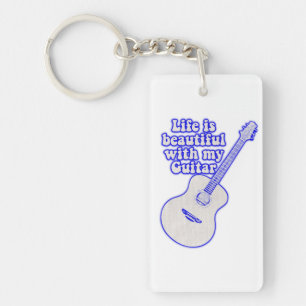 Life is beautiful with my guitar. vintage blue key ring