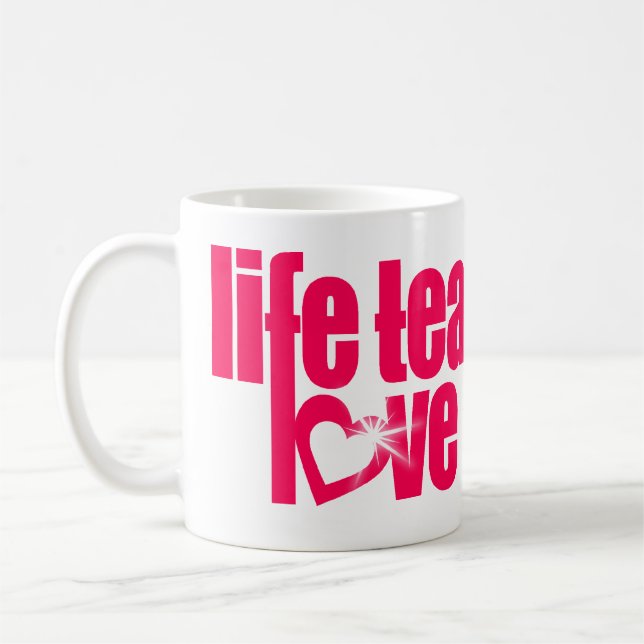 "life teaches love reveals" red slogan mug (Left)