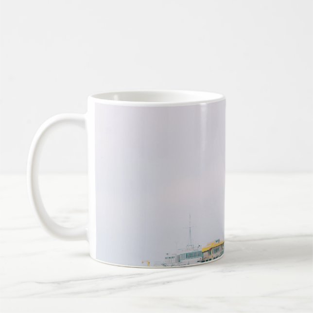 LIFEGUARD POST ON SHORE UNDER WHITE SKY COFFEE MUG (Left)