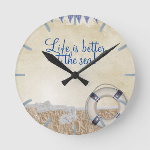 Lifesaver on the sand round clock