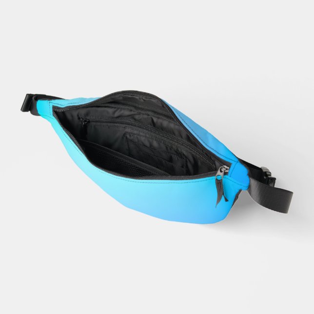 Light blue fanny pack with a black zipper  (Open)