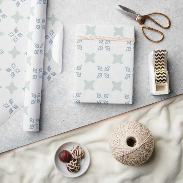 Light blue geometric floral tile pattern on white wrapping paper (Crafts)