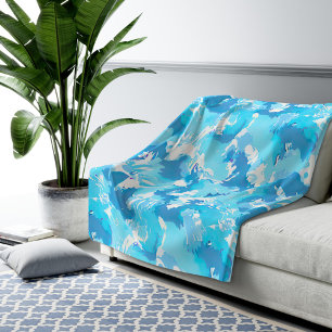 Light blue liquid abstract pattern and white sherpa blanket