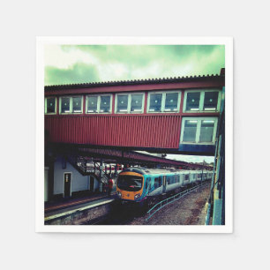 Light blue train , under the bridge  napkin