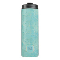 Light blue tropical palm leaves pattern
