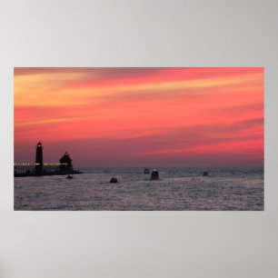 Light house against majestic sunset on channel in poster