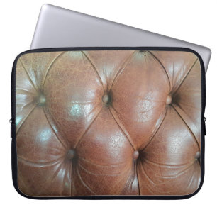 Light on brown leather sofa surface, textureabstra laptop sleeve