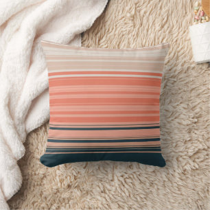 Light peach, coral, and orange striped pattern cushion