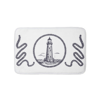Lighthouse at the sea in round rope frame bath mat