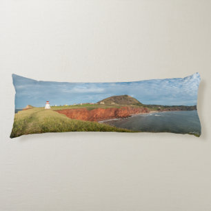 Lighthouse cushion on the edge of the water