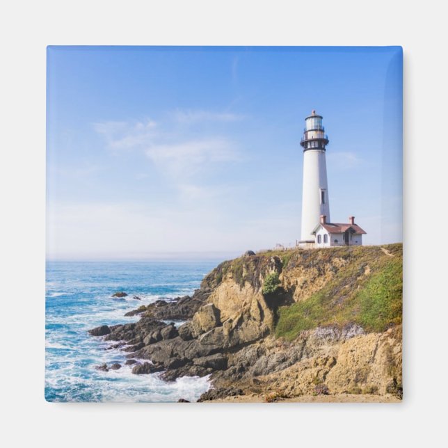 Lighthouse on hill blue sky white house ocean magnet (Front)