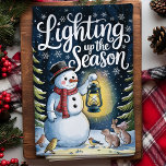 Lighting Up the Season Snowman Christmas Tea Towel<br><div class="desc">Bring the magic of the holidays into your kitchen with this adorable snowman "Lighting up the Season" kitchen towel. Featuring a joyful snowman holding a lantern surrounded by woodland animals, this festive towel captures the warmth and light of the Christmas spirit. Perfect for adding a touch of whimsy and charm...</div>
