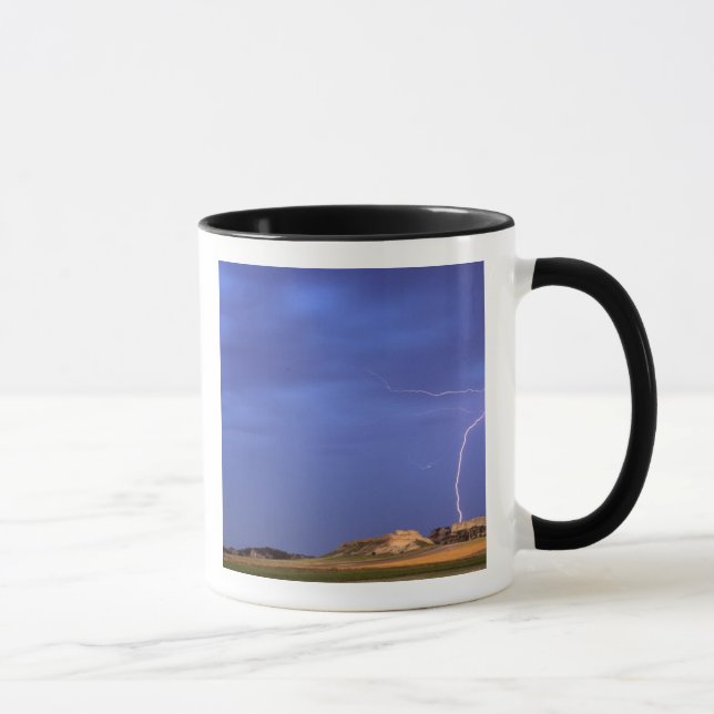 Lightning strikes buttes near Scottsbluff Mug (Right)