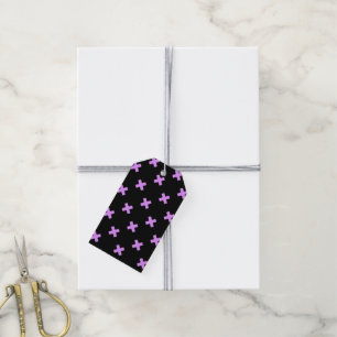 Lilac cross stitches on black gift tags