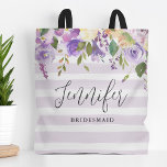 Lilac Floral and Stripes Bridesmaid Monogram Tote Bag<br><div class="desc">Custom monogrammed tote bags make the perfect gift for your bridesmaids and wedding party. This pretty design features a watercolor floral border in shades of pastel purple and green over a lavender striped background. Personalise each bag with your bridesmaids' name and add the bride and groom's initial and wedding date...</div>