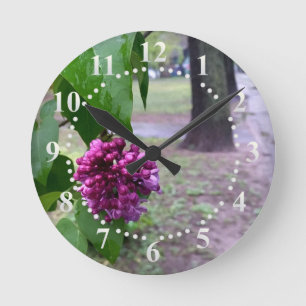 lilac flower in the rain round clock