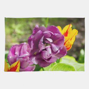 Lilac tulips on a sunny day tea towel