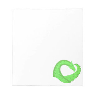 Lime green heart dragon on white notepad
