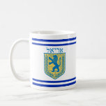 Lion of Judah Emblem Ariel Hebrew Coffee Mug<br><div class="desc">Classic white 11 oz. mug with an image, on both sides, of a blue and yellow Lion of Judah emblem with “Ariel” in Hebrew in blue letters above it and double blue stripe borders. See matching paper plate, square ceramic tile and coasters. See the entire Hanukkah Mug collection under the...</div>