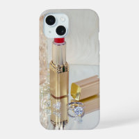 Lipstick and diamond ring on mirror
