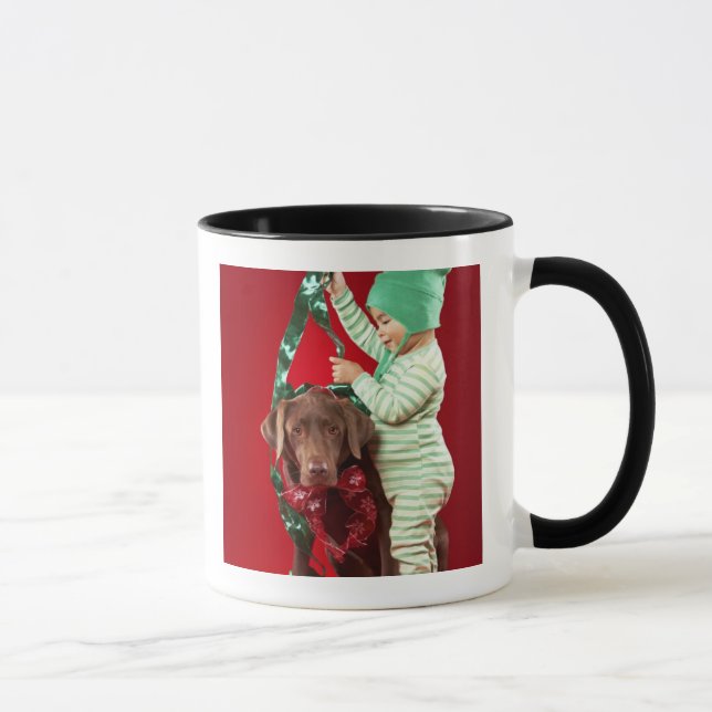 Little boy decorating a dog mug (Right)