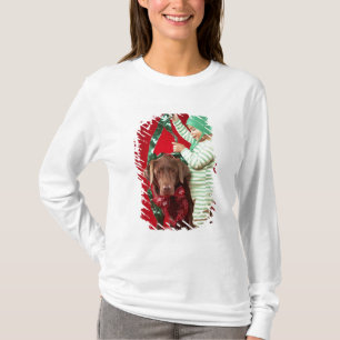 Little boy decorating a dog T-Shirt