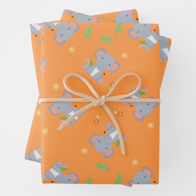 Little cute elephant with flowers orange wrapping paper sheet (In situ)
