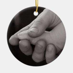 Little foot in big hand Ornament