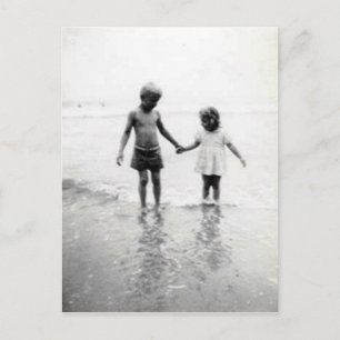 little girl and boy holding hands post card
