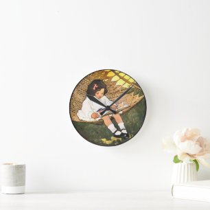 Little Girl reading in a hammock Round Clock