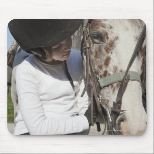 Little girl with her horse mouse pad