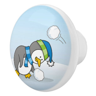Little penguin getting a snow ball ceramic knob