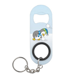 Little penguin getting a snow ball keychain bottle