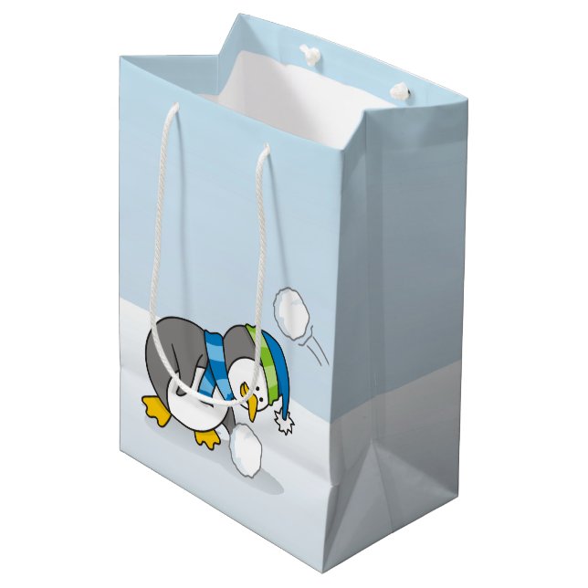Little penguin getting a snow ball medium gift bag (Front Angled)