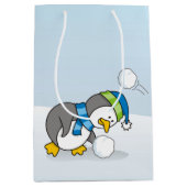 Little penguin getting a snow ball medium gift bag (Front)
